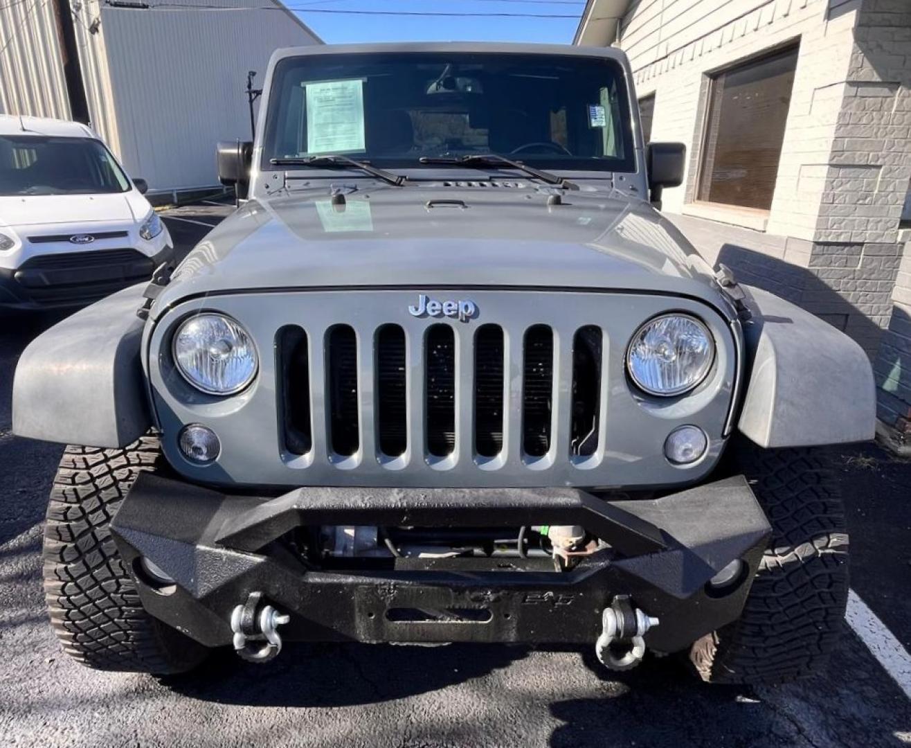 2015 Gray Jeep Wrangler Unlimited Rubicon 4WD (1C4BJWFG4FL) with an 3.6L V6 DOHC 24V FFV engine, located at 945 E. Jefferson Blvd, Dallas, TX, 75203, (214) 943-7777, 32.752514, -96.811630 - Photo#1