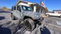 2015 Gray Jeep Wrangler Unlimited Rubicon 4WD (1C4BJWFG4FL) with an 3.6L V6 DOHC 24V FFV engine, located at 945 E. Jefferson Blvd, Dallas, TX, 75203, (214) 943-7777, 32.752514, -96.811630 - Photo#2