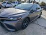 2021 Gray Toyota Camry SE (4T1G11AK6MU) with an 2.5L L4 DOHC 16V engine, 8A transmission, located at 945 E. Jefferson Blvd, Dallas, TX, 75203, (214) 943-7777, 32.752514, -96.811630 - Photo#0