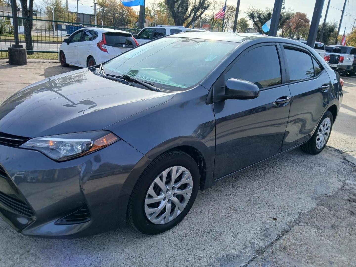 2018 Gray Toyota Corolla SE 6M (5YFBURHE7JP) with an 1.8L L4 DOHC 16V engine, 6M transmission, located at 945 E. Jefferson Blvd, Dallas, TX, 75203, (214) 943-7777, 32.752514, -96.811630 - Photo#0