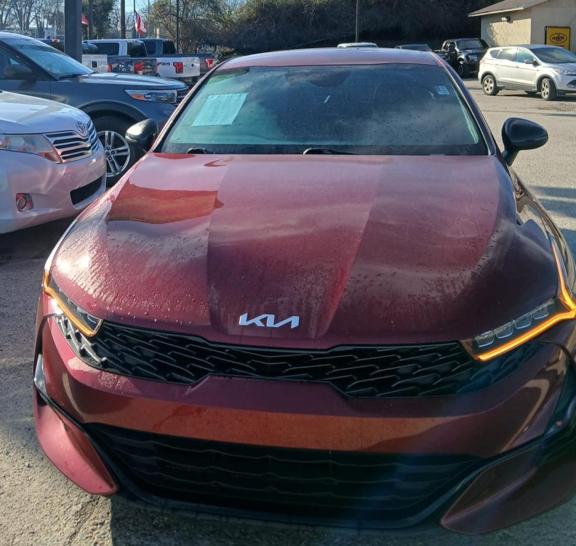 2022 Red /Black Kia K5 GT-Line (5XXG64J22NG) with an 1.6L L4 DOHC 16V engine, 8A transmission, located at 945 E. Jefferson Blvd, Dallas, TX, 75203, (214) 943-7777, 32.752514, -96.811630 - Photo#1