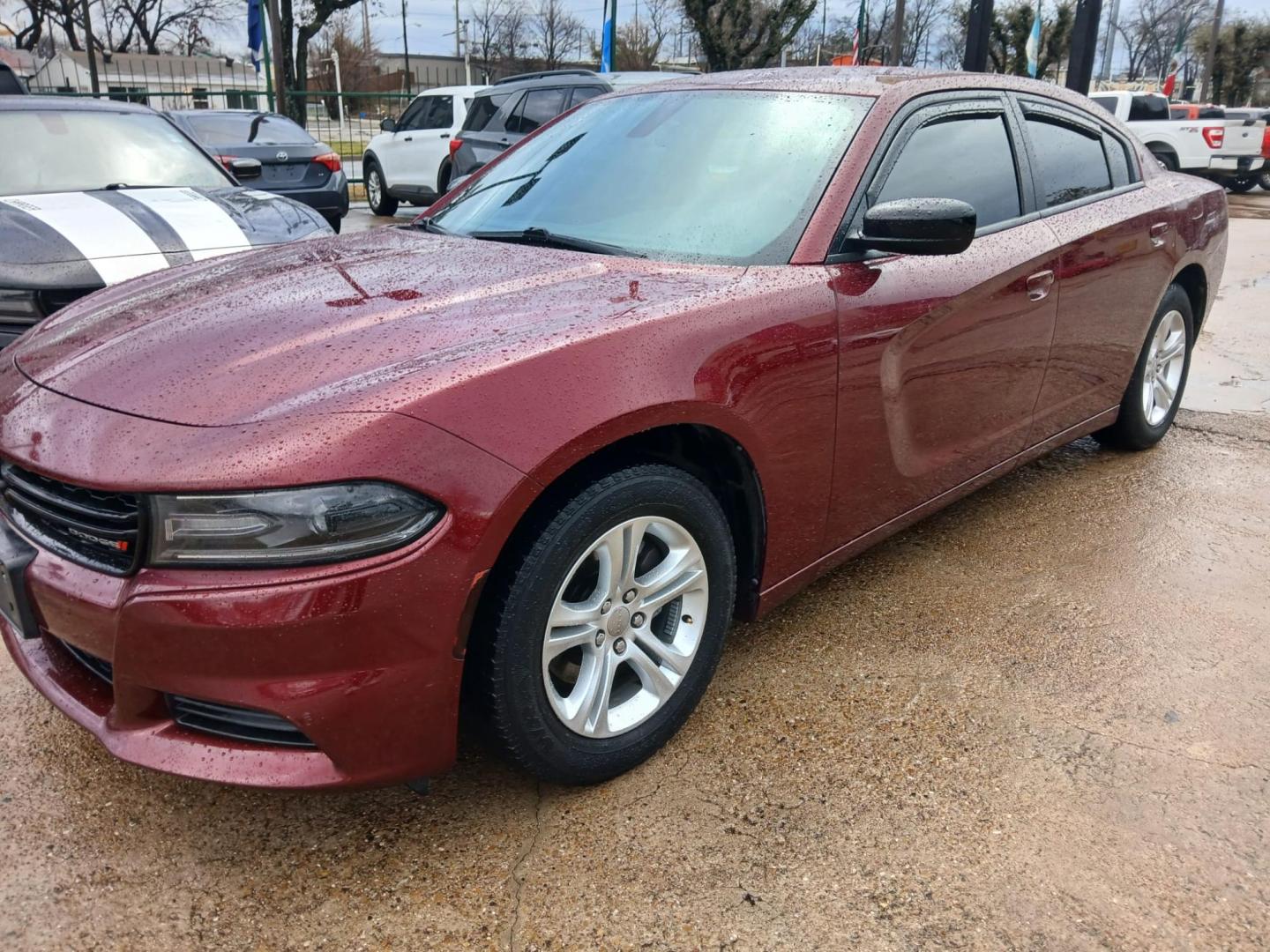 2020 Red Dodge Charger SXT (2C3CDXBG8LH) with an 3.6L V6 DOHC 24V engine, 8A transmission, located at 945 E. Jefferson Blvd, Dallas, TX, 75203, (214) 943-7777, 32.752514, -96.811630 - Photo#0