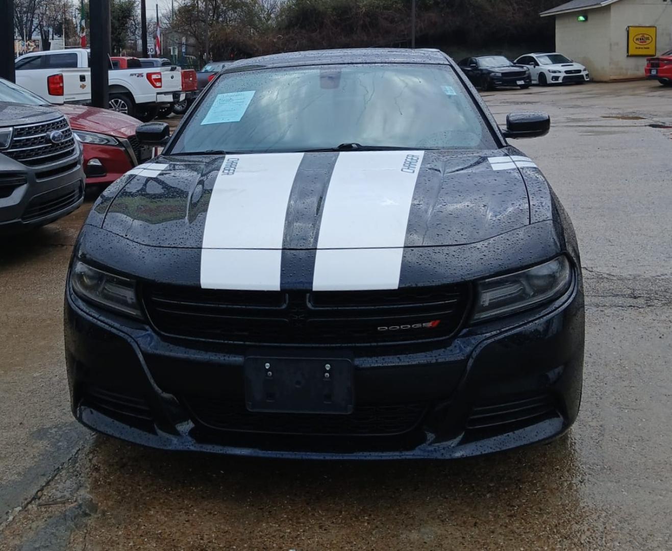 2020 Black Dodge Charger SXT (2C3CDXBG0LH) with an 3.6L V6 DOHC 24V engine, 8A transmission, located at 945 E. Jefferson Blvd, Dallas, TX, 75203, (214) 943-7777, 32.752514, -96.811630 - Photo#1