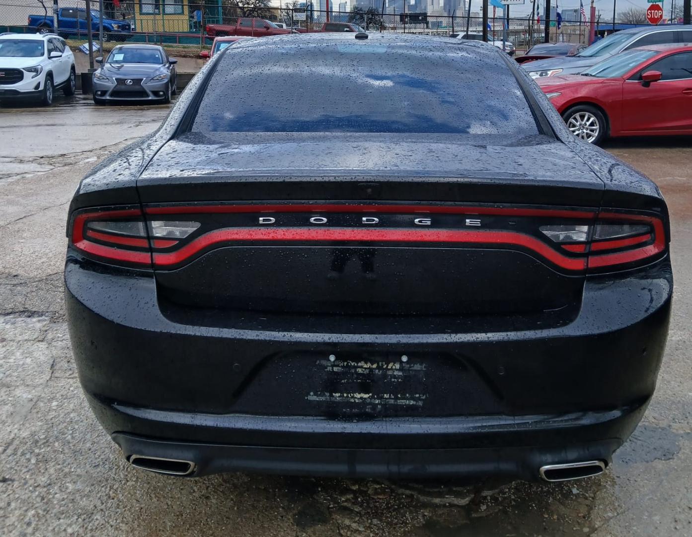 2020 Black Dodge Charger SXT (2C3CDXBG0LH) with an 3.6L V6 DOHC 24V engine, 8A transmission, located at 945 E. Jefferson Blvd, Dallas, TX, 75203, (214) 943-7777, 32.752514, -96.811630 - Photo#3