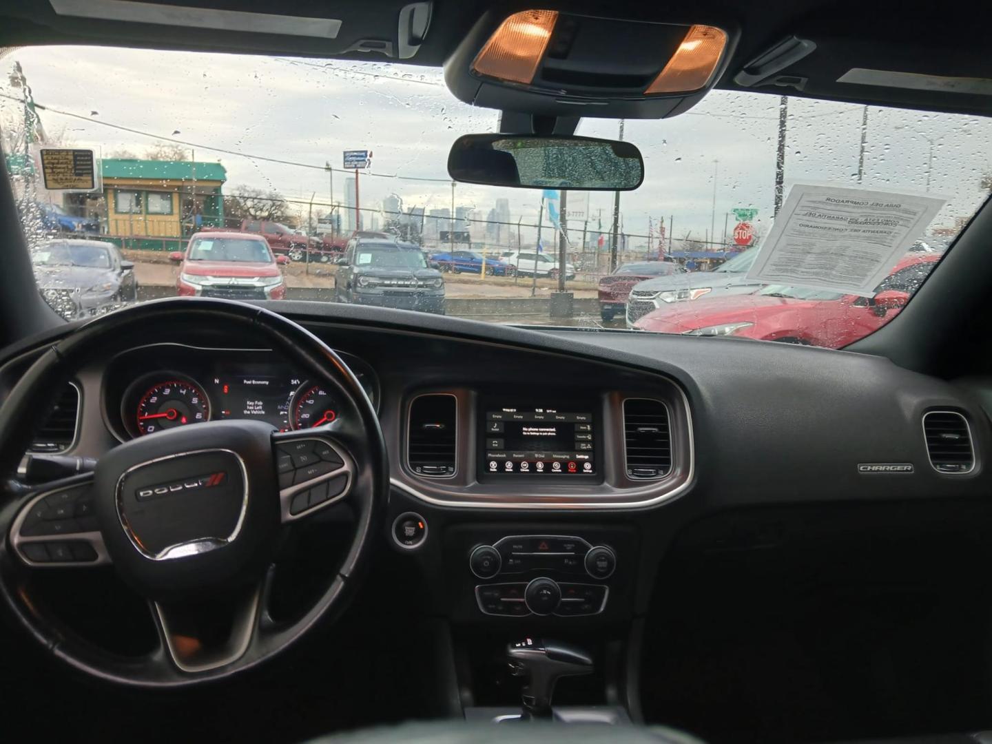 2020 Black Dodge Charger SXT (2C3CDXBG0LH) with an 3.6L V6 DOHC 24V engine, 8A transmission, located at 945 E. Jefferson Blvd, Dallas, TX, 75203, (214) 943-7777, 32.752514, -96.811630 - Photo#4